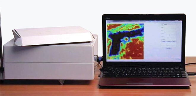 Terahertz image of a hand-gun in a box